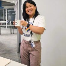 Jacqueline Tong, Web Developer, at the in-office Pride coffee break celebration.