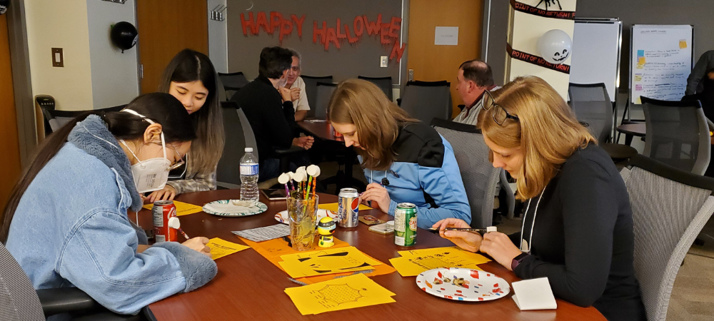 Staff members participating in a Halloween event.