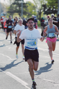 Justin Fletcher running in a race